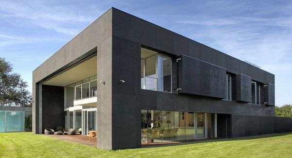 Фото домов построенных из бетонных панелей. 