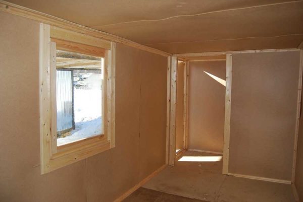 Обшить дачу ДВП - распространенное решение